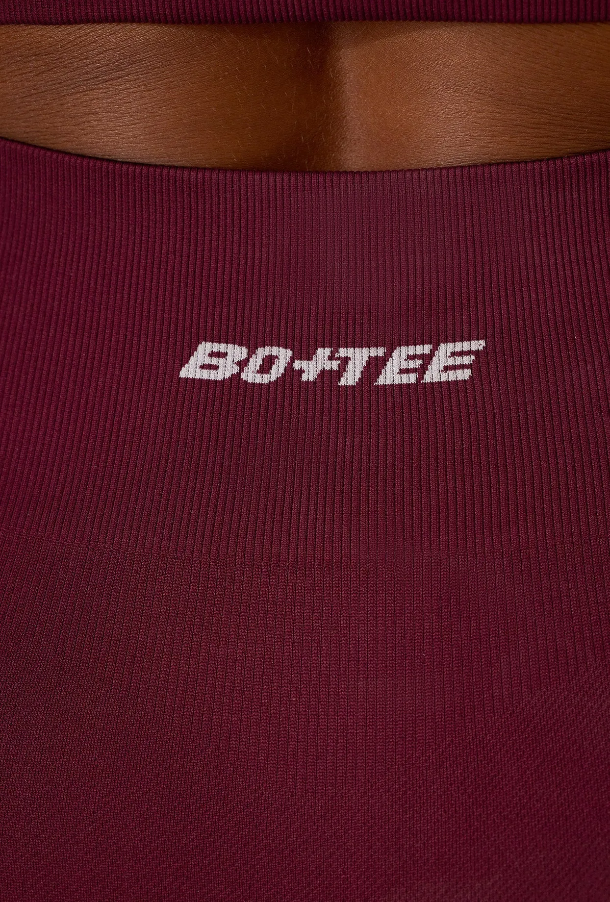 Endurance - Super Sculpt Seamless Mini Shorts in Plum